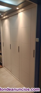 Frente de armario cuatro puertas correderas lisas